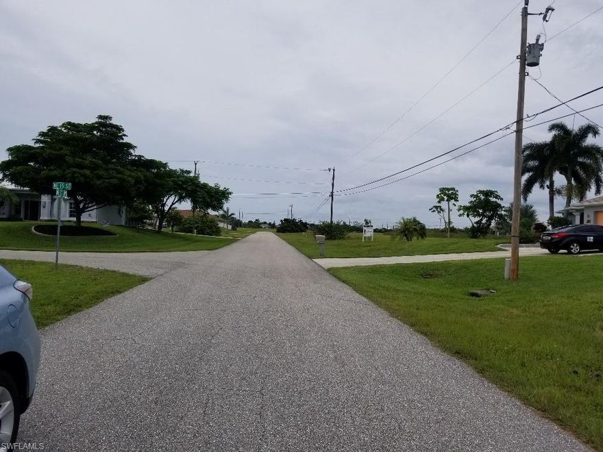 This is a FABULOUS lot with pretty water views, ready to build - plans available for a 1715 sq ft contemporary home. Just need to pay the reassingment fee for a name change. See attached under documents in MLS. Also under documents is the survey showing lot on the Aldo Canal.