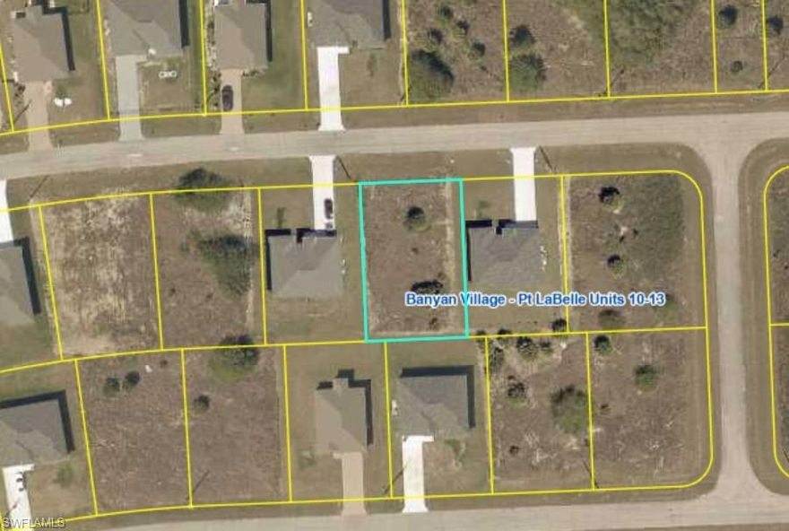 Great location of a 0.23 acres oversized residential corner lot in a peaceful LaBelle neighborhood, offering a spacious setting with natural surroundings, a stunning canal view, and a rear greenbelt for added privacy. Nestled on a quiet street with new construction homes, this parcel presents an excellent opportunity to build your future home or invest in a rapidly growing area. Located within Banyan Village, a developing community with high-speed fiber-optic internet, and providing convenient access to schools, shopping, and SR-80 while still offering a serene, rural atmosphere