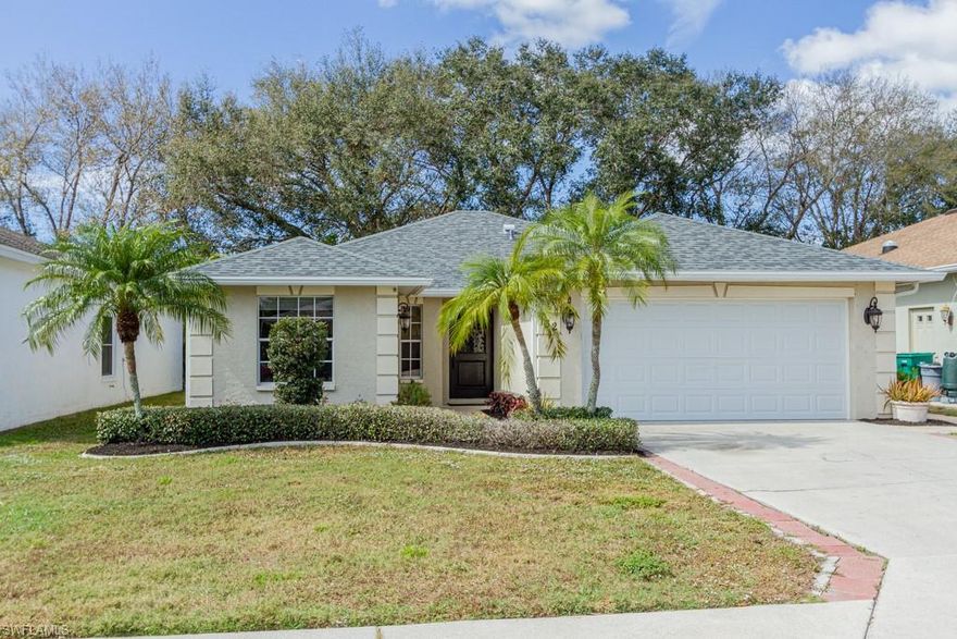 Unbelievable location in a quiet community just minutes to all Naples has to offer. Bright with large windows and French doors that fill the home with natural light. Coffered Ceiling and floating shelving in the living room compliment the open floor plan concept. Freshly painted and all new life proof Laminate and Vinyl Flooring throughout. Beautiful updated kitchen with lots of cabinets, granite countertops and stainless steel appliances. The French doors open to a large open paver patio. Equipped with high quality washer & dryer and Speckled flake epoxy flooring in garage. New roof in 2018. Heated community pool and Park with kids play ground.