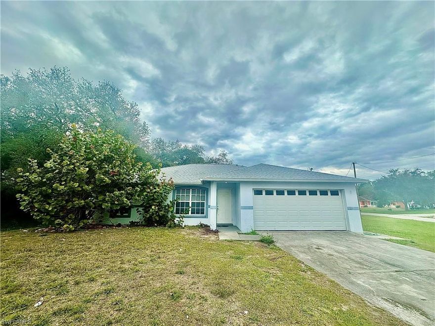 GREAT INVESTMENT OPPORTUNITY IN A HIGHLY PROFITABLE AREA! This SPACIOUS PROPERTY sits on a corner lot with OVER half an acre of total lot area, featuring a NEW ROOF and EXCELLENT MAINTENANCE. Conveniently located just MINUTES FROM FORT MYERS with EASY ACCESS TO SR-82, making it a prime location. Offering 3 BEDROOMS, 2 BATHROOMS, and a 2-CAR GARAGE, this home is BUILT TO LAST and in EXCELLENT CONDITION. SELLER MOTIVATED – PRICED TO SELL! Don’t miss this opportunity—ACT FAST!