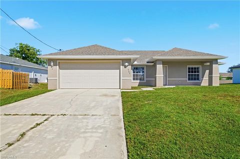 Photo of 4104 13th ST SW, LEHIGH ACRES, FL 33976 (MLS # 225077849)