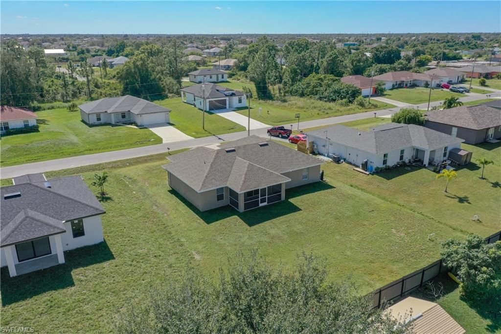 Photo of 4104 13th ST SW, LEHIGH ACRES, FL 33976 (MLS # 225077849)