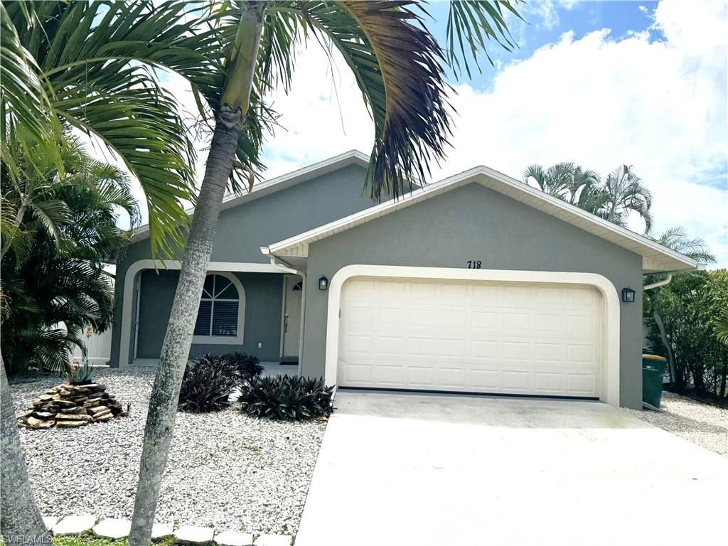 Photo of 718 95th AVE N, NAPLES, FL 34108 (MLS # 226015217)
