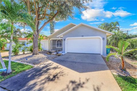 Photo of 718 95th AVE N, NAPLES, FL 34108 (MLS # 226015217)