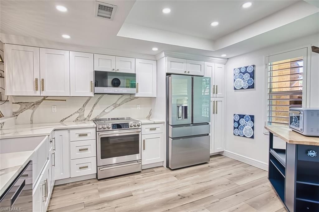 Photo of 6549 Marissa LOOP #21, NAPLES, FL 34108 (MLS # 226017847)