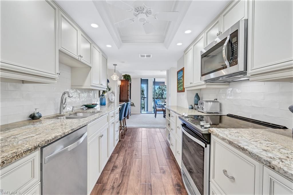 Photo of 2400 Gulf Shore BLVD N #203, NAPLES, FL 34103 (MLS # 225065607)