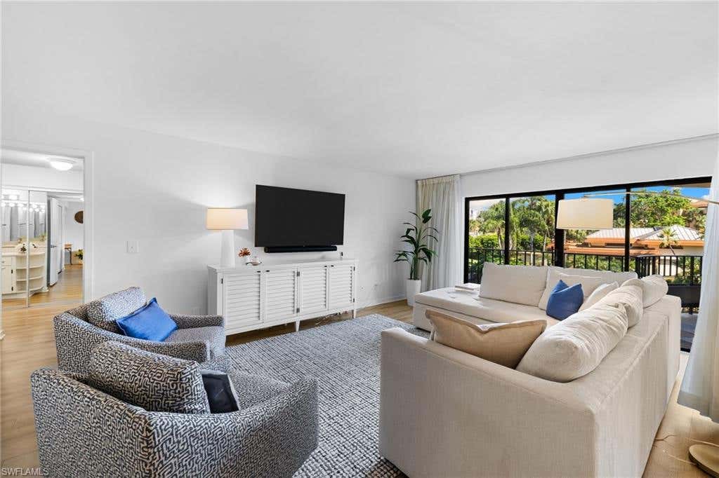 Photo of 6710 Pelican Bay BLVD #422, NAPLES, FL 34108 (MLS # 226025849)