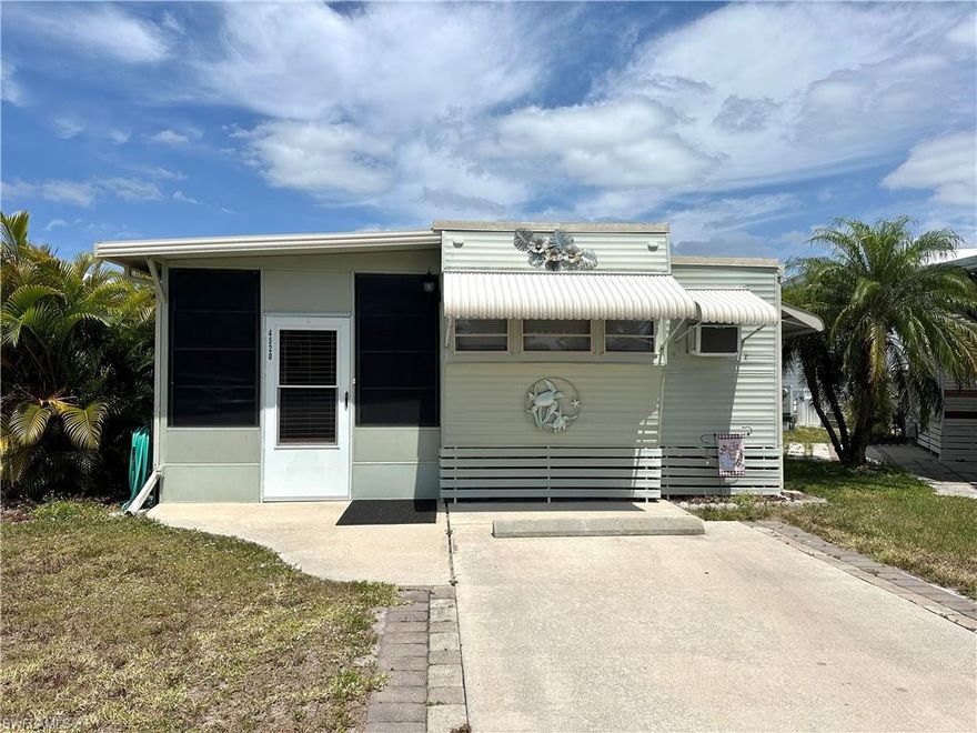 Welcome to this charming 1983 mobile home cottage, where cleanliness and comfort combine for the perfect winter escape! Don’t let the year deter you—this cozy 1 bedroom, 1 bath home features 2 spacious living areas and a large storage area, complete with washer and dryer, making it functional and inviting.

Step outside to enjoy the back patio, which is the ideal spot for relaxing in the sun or entertaining friends and family. With rental income potential of $6,600 for the peak season from January to March, this cottage presents a fantastic investment opportunity for savvy buyers.

In addition to its appealing interior, you’ll find activities galore within the community! Engage in exciting volleyball (both water and sand), pickleball, tennis, bocce, and shuffleboard. Join in on lively dances, delicious dinners, card games, and enjoy the beauty of the butterfly garden. Other social activities like horseshoes and line dancing further enhance the vibrant community atmosphere.

For those who love the water, boat storage is available along with a boat ramp on the Estero River, allowing for delightful days on the water. Don’t miss the chance to make this cozy cottage your own—whether you’re seeking a winter retreat or a rental income opportunity, this mobile home has it all!