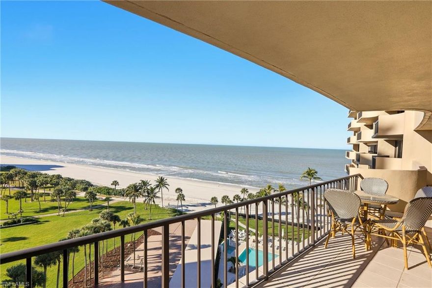 Welcome to Surfsedge in Park Shore, where luxury coastal living meets some of the best views in Naples. This rare 01 stack corner residence offers 3 bedrooms, 2.5 bathrooms, and 1,663 square feet of beautifully updated living space, with sweeping southwest views of both the Gulf of Mexico and Venetian Bay.

This bright end-unit is filled with natural light and features hurricane-rated windows and sliding doors, plus private balconies off every room, making it easy to enjoy sunsets, bay views, and fresh coastal air all day long. Inside, the condo has been fully renovated and opened up for a modern, open-concept layout. The kitchen is finished with quartz countertops, stainless steel appliances, and a clean, modern look that complements the open design.

The owner’s suite includes an updated and reconfigured bathroom with a beautifully remodeled shower, along with thoughtful upgrades throughout the home including custom pocket doors for smarter use of space. You will also appreciate the convenience of a built-in, in-residence washer and dryer and a shared laundry facility. For extra storage, the unit also includes a private owner’s storage closet located right outside the front door near the elevator, perfect for beach gear, bikes and seasonal items.

Surfsedge has recently completed an impressive building renovation, offering a resort-style pool, a refreshed and elegant lobby, an updated fitness center, a brand-new social room, and two guest suites for visiting friends and family. Residents also enjoy beach chairs provided, a kayak rack, a fire pit gathering area, and a private beach walk for easy access to the sand. For those who like to stay active, Surfsedge even offers access to a fitness instructor.
For added protection and peace of mind, Surfsedge has contracted to have storm barriers installed around the entire building when needed, helping reduce the risk of potential storm-related damage.

Additional highlights include a covered carport, 24/7 doorman, and a staffed front desk. All of this is just a short walk to Venetian Village, and only minutes to 5th Avenue South, Waterside Shops, and Mercato. If you are looking for a luxury Park Shore condo with unforgettable views, this one delivers.
