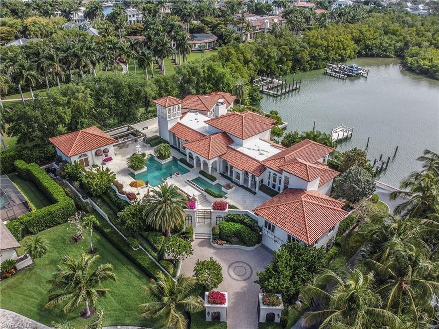 Mediterranean masterpiece by renowned architect, Walter L. Keller being offered for the first time since originally constructed for prominent Naples family. This unique estate offers the two most desired features in Naples, direct beach ownership and waterfront direct Gulf of Mexico boating access for three large vessels. Port Royal Beach Estates is nestled in South Naples surrounded by world class shopping and dining. Originally constructed in 1987 to meet the needs of the first owner yet with the future in mind as to the possible expansion of the estate into a mega estate without having to start from scratch. Very private setting on the Champney Bay with the splendor of Florida's natural habitat as your rear view rather than another home that most view in the community. Truly a once in a lifetime opportunity to secure one of the most prestigious estates in Naples offered today.