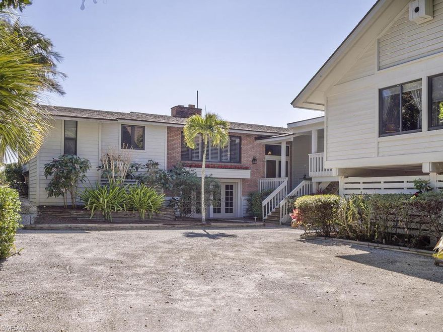 Crafted with poured concrete construction and built in the "Island Cottage" tradition, this 5BR/4.5BA home features a new Chef's kitchen w/top of the line stainless appliances, 2 fireplaces, wood floors, new doors/impact windows, swimming pool, welcoming sunny vistas and privately landscaped grounds. The main house was thoughtfully designed; most primary rooms are directly Gulf front. The Guest house is separated from the main house by a covered walkway and contains 2 spacious bedrooms. The entire home has been renovated and offers open spaces, a private picnic area on the Gulf side of the home to enjoy the pristine beaches and private grounds. Meticulously maintained and loved for 35 years!, located on West Gulf Drive, this property offers the ultimate dream location!