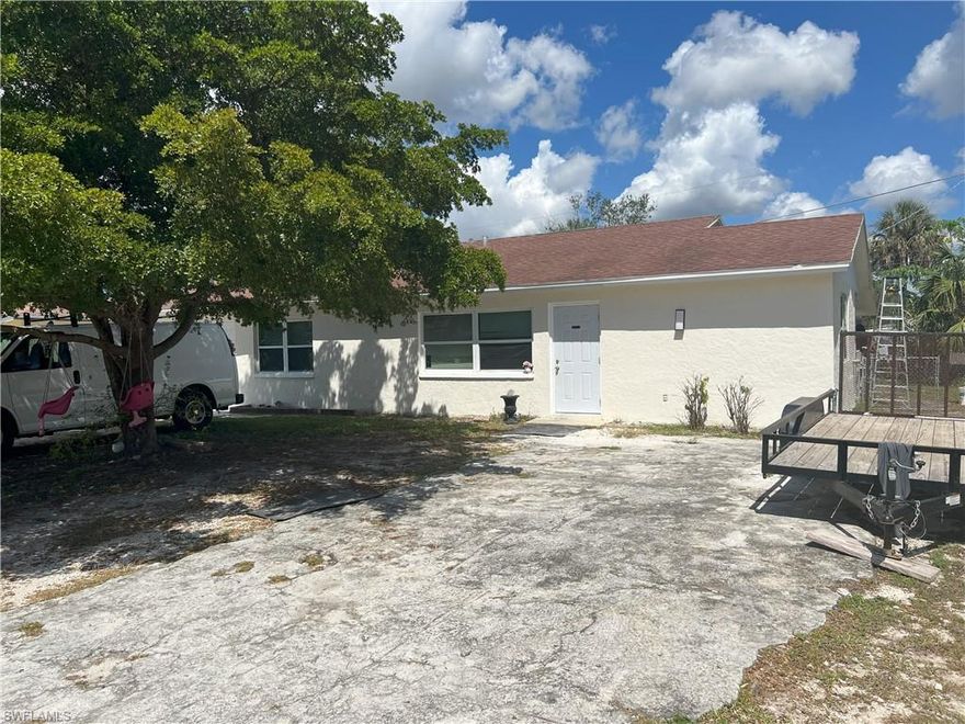 Excellent income producing duplex. Three bedroom one bath unit and Two bedroom one bath unit. New kitchen with granite. convenient to Collier or Lee county with access to Livingston/ three oaks and I-75