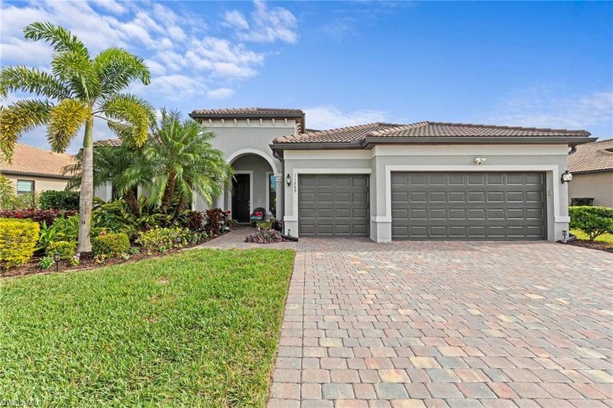 This distinguished three-bedroom residence with a den and three bathrooms exemplifies superior craftsmanship and meticulous attention to detail. The property showcases designer upgrades throughout, including an expansive screened lanai with unobstructed lake views. The kitchen features comprehensive updates such as a Kutch propane stove, custom external exhaust fan system, designer pantry, soft-closing cabinets with pull-out shelving, reverse osmosis water system at the sink and whole house water filter. Premium ceramic tile flooring has been installed in the entryway, office, kitchen/dining area, laundry, and living spaces, while solid wood floors accentuate the primary bedroom, guest bedroom, and den. All bedrooms and the kitchen pantry benefit from built-in designs by Florida Closet Factory, with the primary bedroom closet also featuring specialized jewelry drawers. The laundry room includes a dedicated sink and is finished with upper and lower cabinetry. Each bathroom is equipped with raised toilets for enhanced comfort. The AC system utilizes ultraviolet light for mold prevention, while sludge traps provide anti-algae protection. The entire home is fitted with designer window treatments and disk LED lighting, complemented by a whole-home surge protection system. The three-car garage with an epoxy floor, electric vehicle charging port and Lectron Rapid Charging. A whole-house generator with supplementary surge protection and an external storage tank ensures power supply for up to two weeks. All windows and sliding doors upgraded with high-impact low E glass and frames, while the lanai features electric hurricane and sunscreen shutters. Landscaping has been fully renovated to enhance curb appeal. Bridgetown at the Plantation is a resort-style community that features an amenity center with a resort pool, lap pool, tennis and pickleball courts, bocce, a state-of-the-art fitness center, a vibrant social calendar, and more. This move-in-ready home presents an exceptional ownership opportunity. This home is situated on a premium Cul de sac lot offers both a beautiful lake view and privacy - a rare find! The Pinnacle is the most sought-after model in Bridgetown and this one shows like a model home. Even the most discriminating buyer will be impressed with the immaculate condition and there are upgrades galore including top of the line KitchenAid appliances, upgraded cabinets with pull out shelving, wine bar, Storm Smart shutters, LED under cabinet lighting and landscape lighting and a gorgeous pool/lanai area to enjoy the fabulous view! The zero edge sliding doors will open the space even more to enjoy the beautiful Florida winters! This home also has a 3-car garage with a 4-foot extension. Bridgetown at Plantation is a resort style community that offers a fabulous amenity center with resort style pool, lap pool, tennis, pickle ball, bocce, state of the art fitness center, and an active social calendar. This maybe home you've been waiting for!