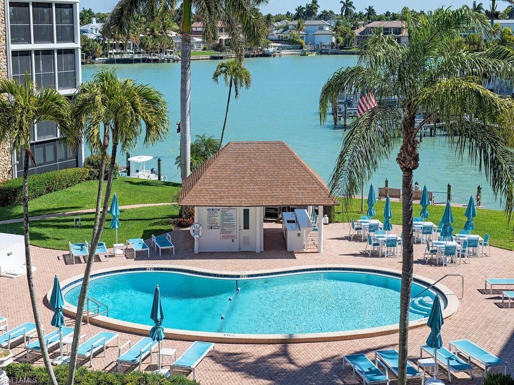 Photo of 2900 GULF SHORE BLVD N #410, NAPLES, FL 34103 (MLS # 226008395)