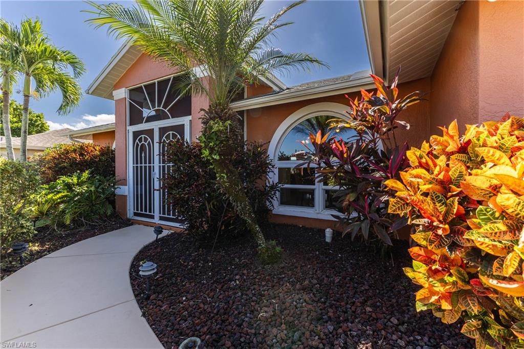 Photo of 212 SE 30th TER, CAPE CORAL, FL 33904 (MLS # 2025018167)