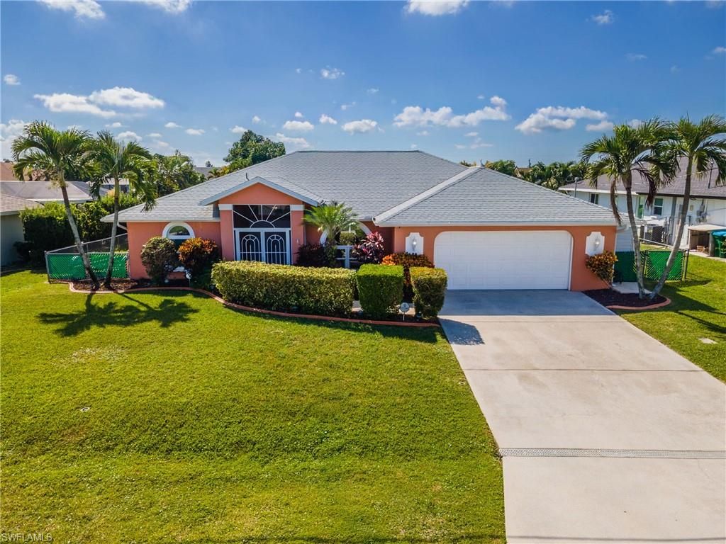 Photo of 212 SE 30th TER, CAPE CORAL, FL 33904 (MLS # 2025018167)