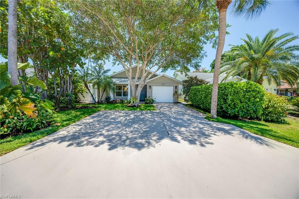 Photo of 816 102nd AVE N, NAPLES, FL 34108 (MLS # 225083856)