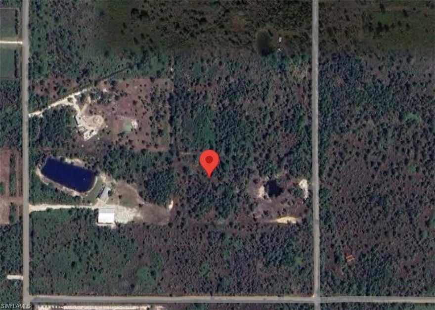 Welcome to Golden Ranches! Beautiful vacant residential 5 acre parcel zoned Agricultural (AG). Perfect for your future home or small Homestead! Located in a peaceful rural area of Charlotte County. Good elevation gives several choices for building sites on the property. This property allows for single-family or manufactured homes along with space for animals, gardens, or a barn. A tranquil place you can enjoy the nature, wildlife, quiet, and private surroundings. Great place for ATVs, motorbikes with four tandem truck loads of hard packed shell dirt to make jumps for the motorbikes which can be pushed around by the running CAT DOZER that comes with the property. Enjoy the 1/8 acre pond for fishing. No deed restrictions. Power close by for future hookups. Gate at entrance and fenced in, plus a culvert. No flood Zone. Close to the huge 16,612 acres of the preserve administered by the Florida fish and wildlife conservation commission.