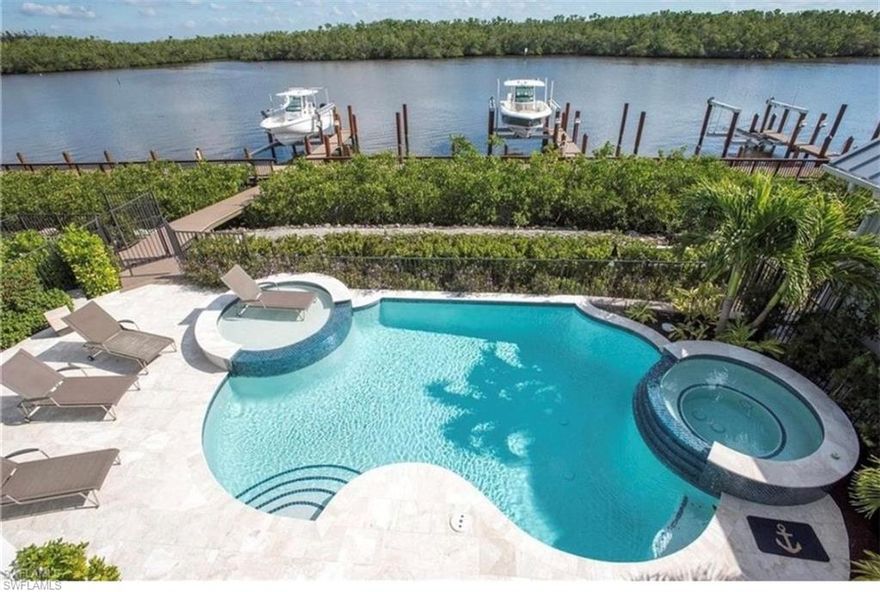 Unobstructed view of the large BAY. Mangrove Bay - luxury Waterfront community nestled along the Gordon River. Old Florida architecture, by MHK Architecture, with Gulf access private boat slip included with the purchase. This Useppa III plan offers one of the BEST large water views of the Gordon River! Superior construction features luxury appointments throughout this residence encompassing approx. 4,100 SF under roof and 3-bedroom, 3 1/2 bathrooms, spacious flex space on the 2nd level, expansive 2nd story deck area, private guest house which including bedroom, bath, kitchenette and sitting area. This home includes (but not limited to), solid standing seam metal roofing, natural gas, private pool & spa, custom crafted cabinetry and a Wolf/Subzero appliance package, roll down electric screens and hurricane system. Residents will be the recipients of Luxury amenities building with private on-site storage for resident kayaks/paddleboards and/or jet skis, private community boat ramp and a wellness/fitness center with fitness equipment. Barely lived in - 16 weeks total at most.