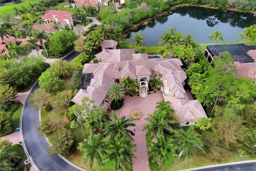 Bank owned Incredible opportunity! Ultimate grandeur awaits in this magnificent estate home in Mediterra.The front of the home is spectacular, and features multiple fountains and a travertine walkway across a pond to reach the imposing front doors. Indescribable opulence, from the travertine mosaics stretching up 20ft to the ceilings of the entry ways, to the marble/copper inlays in the travertine floors.
Nothing has been overlooked in this 6br home.Semi precious stone countertops, crystal sinks, a giant kitchen, butlers pantry, and a wine room! A home theatre with lobby area/concession stand and a billiards/party room for entertainment. Separate upstairs suites on either side of the home, perfect as in-law suites, maids quarters, or just more space for the extended family.Each have separate living areas with kitchenettes and washers/dryers. The bath features his (multi spray) and hers(steam) showers, a soaking tub, separate water closets and a urinal.The 150ft resort style pool has a slide and a private grotto area, as well as a spa big enough for 10-12. Cross the travertine bridge straddling the pool to an enclosed outdoor kitchen cabana with lovely views of the lake.