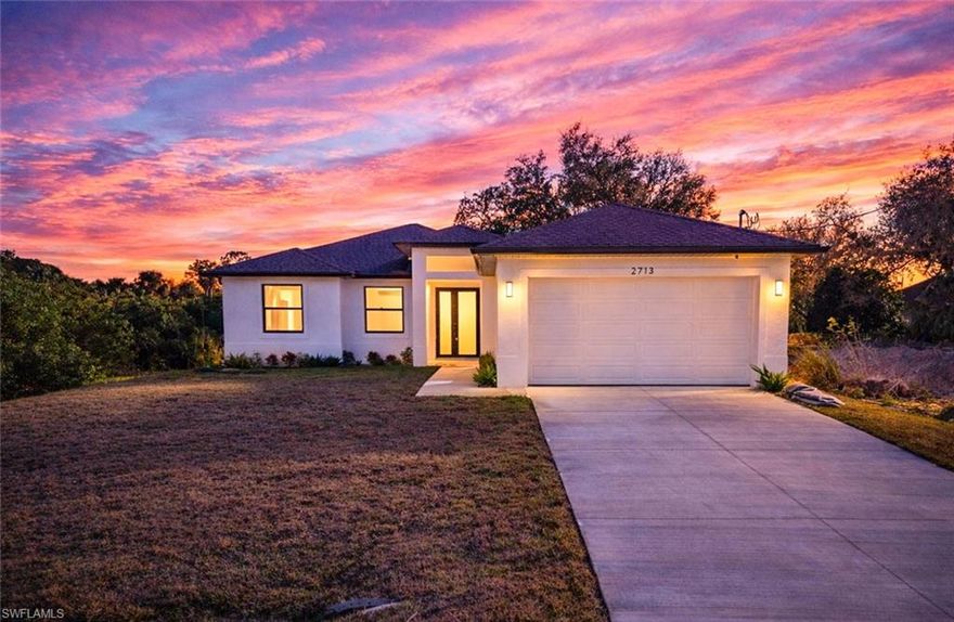 Move right into this impeccably designed new construction home featuring a versatile 3-bed + den layout. Spanning over 1,600 sq. ft., the open-concept interior feels exceptionally spacious thanks to soaring ceilings and oversized doors throughout. From the sleek quartz countertops in the kitchen to the privacy-focused split-bedroom design, every detail has been thoughtfully executed. With a large laundry room for added convenience and a prime location near top-rated schools and shopping, this property is both a dream home and a savvy investment. Your Lehigh Acres sanctuary awaits!