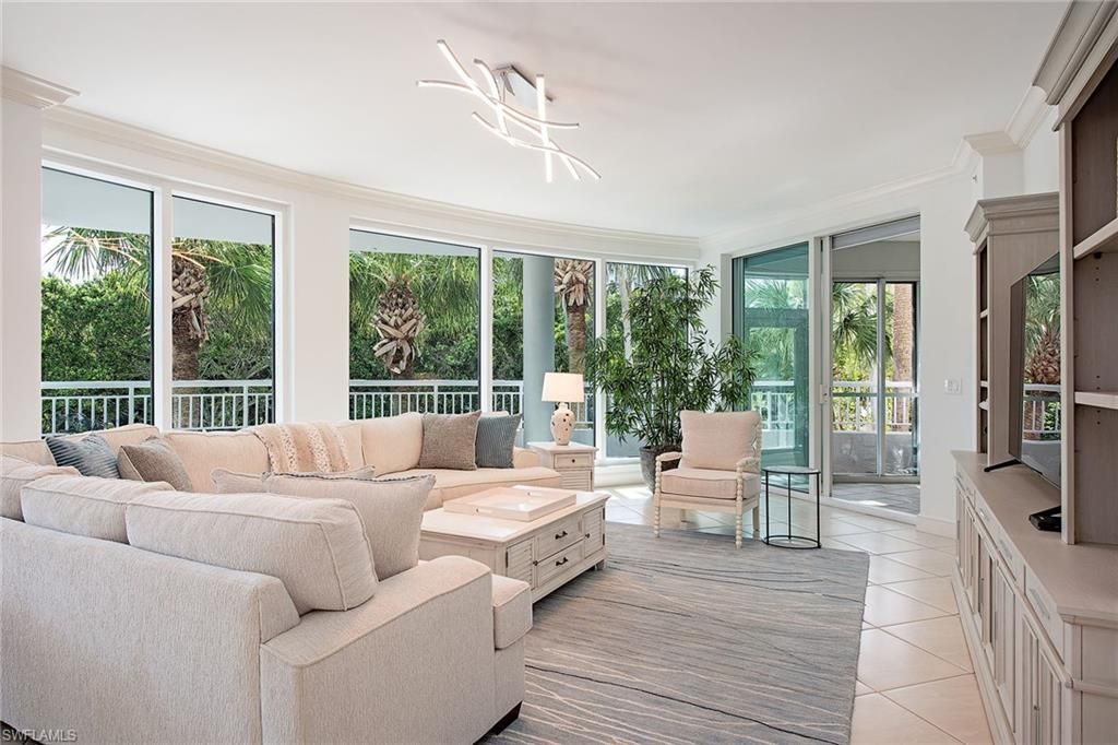 Photo of 4151 Gulf Shore BLVD N #201, NAPLES, FL 34103 (MLS # 225078024)