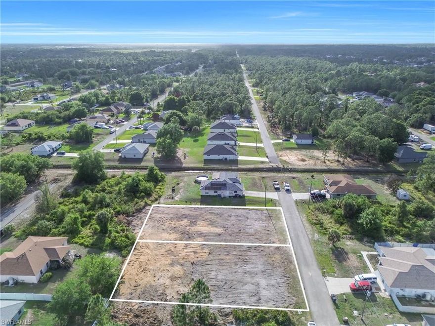 Unlock the potential of this exceptional build-ready lot in Lehigh Acres. Priced at just $25,000, this fully cleared property is ready for immediate construction, ideal for builders, investors, or future homeowners looking to fast-track their project. Located in the highly desirable 33971 zip code, one of the fastest growing areas for new construction in Lehigh Acres, this lot offers both convenience and opportunity. Enjoy close proximity to Lee Boulevard with easy access to shopping, dining, and schools. The property features a favorable elevation compared to the street, helping reduce construction costs. Even better, the adjacent lot is also available for sale, giving buyers the option to purchase both parcels and maximize space, flexibility, and cost efficiency for development. Skip the hassle of site preparation and take advantage of a ready to build opportunity in a rapidly growing community. Adjacent lot is also available for sale. Both parcels can be purchased together as a package deal.