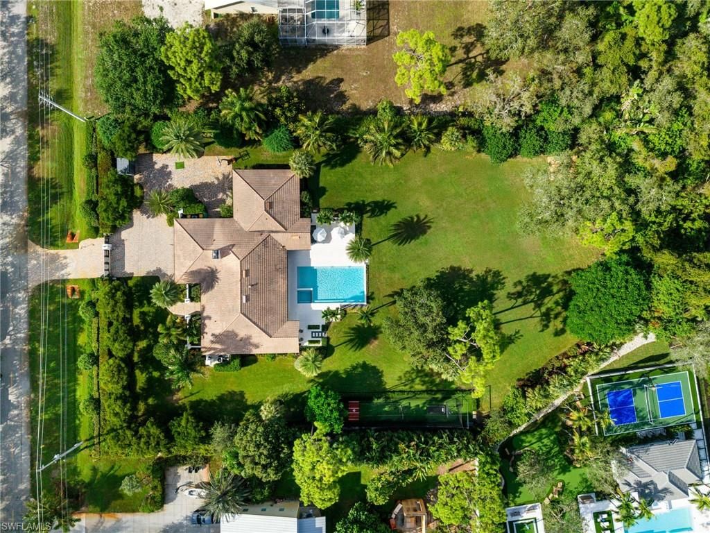 Photo of 6818 Trail BLVD, NAPLES, FL 34108 (MLS # 225073980)