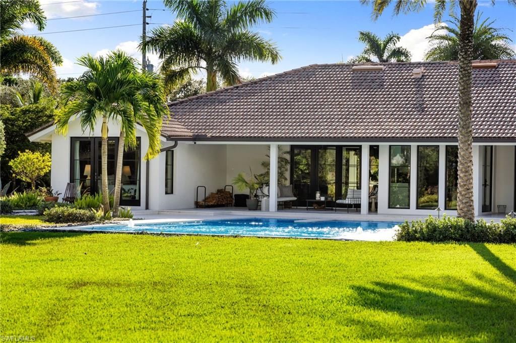 Photo of 6818 Trail BLVD, NAPLES, FL 34108 (MLS # 225073980)