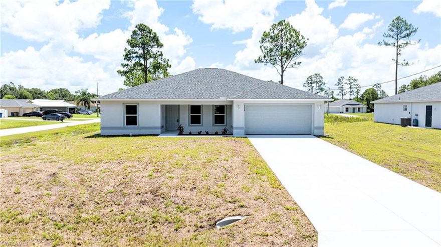Buyers Down Payment Assistance Available! You Will Be Amazed By The Quality Of This Brand New Construction 3 Bedroom/2 Bathroom/2 Car Garage Home Located On An Oversized Corner Lot With Eastern Exposure For Those Lovely Florida Sunrises In The Greenbriar Neighborhood Of Lehigh Acres, FL. This Home Has 1596 SF Under Air And Is COMPLETELY Finished With A CO AND IS MOVE-IN READY TODAY! The Island Kitchen Comes With Black Granite Countertops And Backsplash, STAINLESS STEEL APPLIANCES, Real Wood White Shaker Soft Touch Cabinet Doors & Drawers, Pendant Lights, Stainless Steel Fixtures, And A Large Walk-In Pantry. Other Upgrades Include; HURRICANE IMPACT WINDOWS AND DOORS, A HUGE 32 Foot Lanai (Great For Entertaining), White Tile Flooring Throughout The Entire Home, High Ceilings, Large Living Room/Great Room, Dining Area With A Great View, Custom Interior/Exterior Two Tone Paint, Ceiling Fan/Light, Large Walk-In Master Closets, Granite Countertops And Real Tiled Shower Tub Area In Both Bathrooms, 1 Year Home Warranty, Oversized Canal Lot, Plenty Of Room For A Pool, And A Laundry Room Inside The Home. Enjoy The Sunrises From The Oversized Covered Lanai (Perfect For Bar-B-Que's). This Home Is Close To Regional Shopping Malls, Major League Baseball Spring Training, Golf Courses, Interstate I-75, Regional Airport, FGCU, Restaurants, Schools, Parks, Boat Ramps, Great Sport Fishing, And Those Amazing White Sand Beaches Of The Gulf Of America! Call Today For Your Private Showing!
