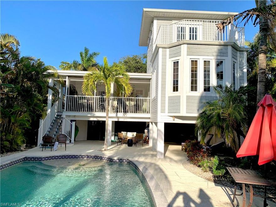 Situated on the South end of Fort Myers Beach minutes from Bonita Springs and Naples. TROPICAL RETREAT just steps away from the beautiful Fort Myers Beach, WHITE sandy beaches and the Gulf of Mexico. Surround yourself in the comforts of a Beachy Island Style dream home with a resort style pool.  The airy floor plan offers casual living with two bedrooms on the main floor plus a 3rd bedroom loft with a private deck overlooking the pool and partial Gulf views. Don't miss this hidden gem.