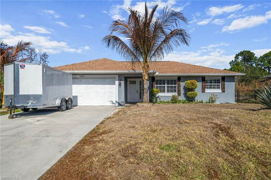 Come see this updated 3-bedroom, 2-bath home built in 2015, nestled in a quiet neighborhood  of Northwest Lehigh Acres. This move-in-ready concrete block home offers a comfortable  1,206 sq. ft. of living space with a desirable split-bedroom floorplan and tile flooring throughout  the main areas for easy maintenance. The light and bright kitchen opens to the living and  dining area, creating an inviting space for everyday living and entertaining. Peace of mind  comes standard with a new roof, new A/C, and a new water system, so big-ticket items are  already taken care of and ready for years of reliable service. Step outside to the oversized 0.27- acre lot with plenty of room to add a pool, play area, or garden, plus a large driveway that  provides ample parking space for guests, work vehicles, or recreational toys. Additional features include central electric heating and cooling with ceiling fans, single-hung  windows, attached 2-car garage, stucco exterior, and shingle roof. Located in a non-gated  community with no HOA fees or deed restrictions, you’re just a short drive to Lee Blvd.,  Sunshine Blvd., shopping, dining, and commuter routes into Fort Myers. This “like new,”  updated inside-and-out home is perfect for first-time buyers, downsizers, or investors— schedule your showing today before it’s gone.