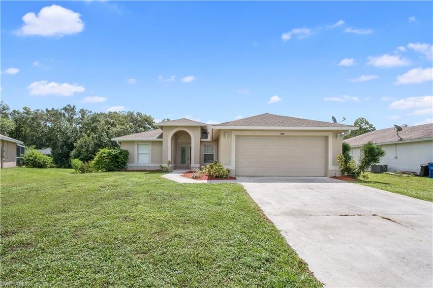 A beautiful move-in ready home is now available under $150k! 3 bedrooms, 2 bathrooms, 2 car garage. Split, open floor plan. Tile in the wet areas and new carpet just installed. Fresh paint and landscaping has just been added as well! Located on an over sized lot with added easement in the back, great for kids and pets to roam! Well maintained and clean. Situated in an established neighborhood and close to shopping, dining, and main roads. Less than a 30 minute drive to Ft. Myers International Airport and 45 minutes to the white sands of Ft. Myers Beach! Low taxes and no HOA! Do yourself a favor and take a look at this one before making offers on any others; you'll be glad you did!