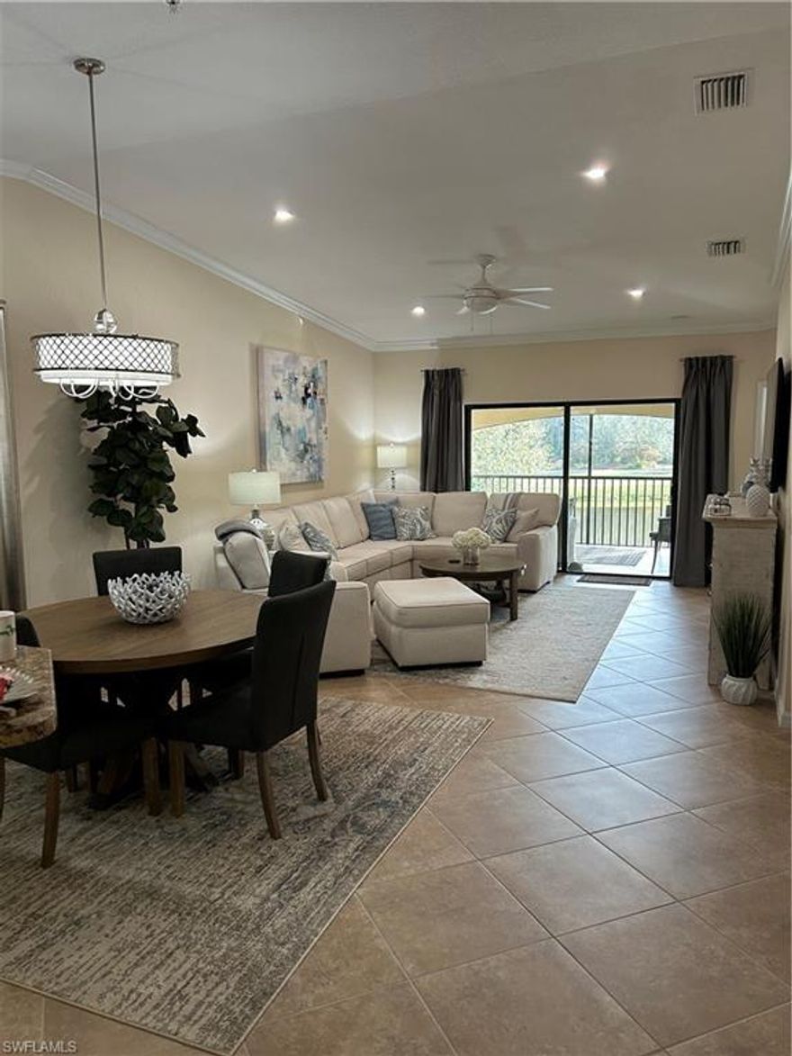 Upgrades galore with this Stunning upstairs Arabella END UNIT Veranda with Golf Membership.  Amazing views of the lake, preserve, and golf course from your cozy back lanai with a new storm smart shutter. Plantation shutters,
extended crown molding, extended tile in the lanais, custom light fixtures, and professionally decorated makes this condo feel like a real home. Has a Great location close to the satellite pool, and mailboxes , and lots of extra parking for guests. Bonita National is home to a 18 hole Championship Golf course, 8 Har Tru Lighted Tennis courts,resort style swimming pool with waterfall and lap lanes,  work out center, poolside bar and grill, and beautiful clubhouse with more formal dining and bar.