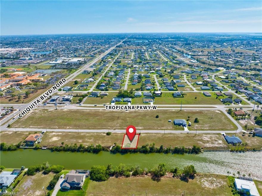 Position your business or development in one of Cape Coral’s fastest-growing corridors with this exceptional freshwater lot. Ideally situated near the intersection of Chiquita Boulevard and Tropicana Parkway, the property offers convenient access to major roadways, established businesses, and expanding residential communities. Designated for Commercial Professional use and zoned P-1 (Professional), this parcel provides excellent flexibility for a variety of uses, including office space, medical facilities, and professional services. Take advantage of this prime investment opportunity in a high-growth area with strong future potential.