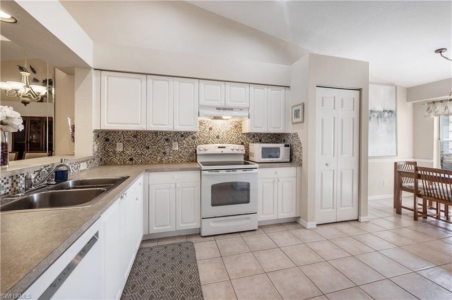 Discover the perfect blend of comfort and convenience in this delightful 3-bedroom, 2-bathroom home located in the highly sought-after Royal Villas at Crown Pointe. With its bright and airy layout, this home is designed for easy Florida living! Step inside to find a spacious living area filled with natural light, perfect for relaxing or entertaining. The well-equipped kitchen offers plenty of storage and counter space, making meal prep effortless. The primary suite provides a peaceful retreat with a private en-suite bath, while two additional bedrooms offer flexibility for guests, a home office, or a hobby room. Enjoy the outdoors on your private patio, ideal for morning coffee or evening relaxation. The attached 2-car garage adds extra convenience, and with the HOA covering almost everything except electric, maintenance is simple and stress-free! Set in an active and welcoming community, you’ll have access to fantastic amenities and a great social atmosphere. Plus, you’re just a short drive from downtown Naples, world-class dining, shopping, and the area’s breathtaking beaches. Don’t miss your chance to own this gem in a prime location