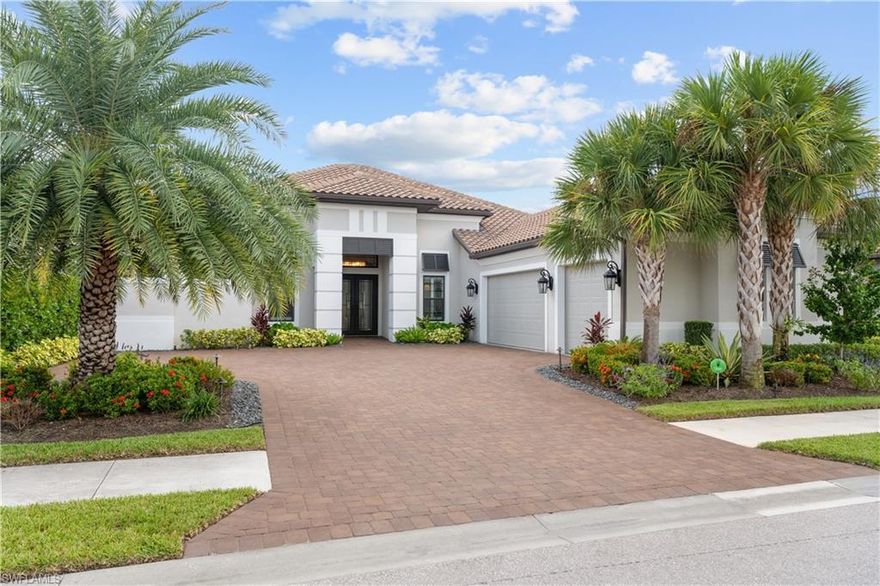 LIVE A VACATION LIFESTYLE IN ESPLANADE! FULL GOLF MEMBERSHIP! Built in 2019, this stunning “Mercede” floorplan home sits at the end of a cul-de-sac street on a SOUTH REAR FACING lot overlooking the 10th green and lake on the coveted Tulipano Terrace of Esplanade Golf & Country Club. Offering 3,660 sq ft of luxurious living space, this thoughtfully designed home features 3 bedrooms, den, bonus room and 3.5 baths with soaring 12-14’ ceilings throughout the entire home. An open-concept great room that seamlessly extends to the lanai through a 16’ pocketing sliding glass door make this home perfect for entertaining. The kitchen is a chef’s dream with Monogram appliances including a GAS six burner cooktop, double wall ovens, beverage cooler, quartz countertops, and an abundance of cabinetry including double stacked upper cabinets to complete the high end look. The primary suite is a private retreat with his & hers custom closets with built-ins and a spa-inspired bath featuring dual vanities and an oversized shower with three shower heads. Two additional floor guest suites, each with their own ensuite bath and closets with built-ins cabinets, provide comfort and privacy. Designed for indoor-outdoor living, the expansive lanai boasts 800 sq. ft. of covered space, a cypress wood-stained ceiling, outdoor kitchen, saltwater gas-heated pool with flush spa, and two elegant water bowls for a serene ambiance. This home is 100% storm ready with hurricane impact windows/doors, electric motorized roll down hurricane screens on the lanai, and a brand new whole house generator (2024). A long list of special features include: brand new wrought iron front door with matching transom window (2025); whole house water filter/softener system; plantation shutters on all windows; finished garage floor; level V shaker style cabinetry with quartz countertops throughout; recessed lights in every room; lush landscaping around the entire property with landscape lighting; two zone AC; and more! This extraordinary home offers the perfect balance of elegance, comfort, and resort-style living—enhanced by the included full golf membership in one of Naples’ most coveted communities. Esplanade Golf & Country Club of North Naples offers a true “Lifestyle Community” with world-class amenities, including a resort pool with cabanas and the popular “Bahama Bar,” tennis, pickleball, bocce, a 14-mile network of bike/walking trails, and an 18-hole private golf course. The impressive 15,000 Sq Ft clubhouse features a restaurant, bar, wine-tasting room, wine lockers, and a Starbucks-style café. Best of all, the property’s landscaping, irrigation, golf membership, and all community amenities are just $3,496/quarter — no additional fees or memberships required! Don't miss your opportunity to own this exceptional home in one of Naples’ most sought-after communities. Schedule your tour of this stunning home and Esplanade Golf & Country Club today! NON FLOOD ZONE/NO FLOOD INSURANCE REQUIRED/ZONE X!