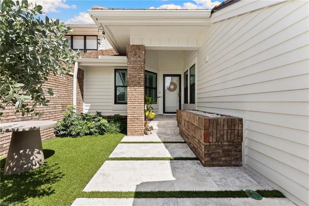 Photo of 4006 Crayton RD #A-2, NAPLES, FL 34103 (MLS # 225072647)