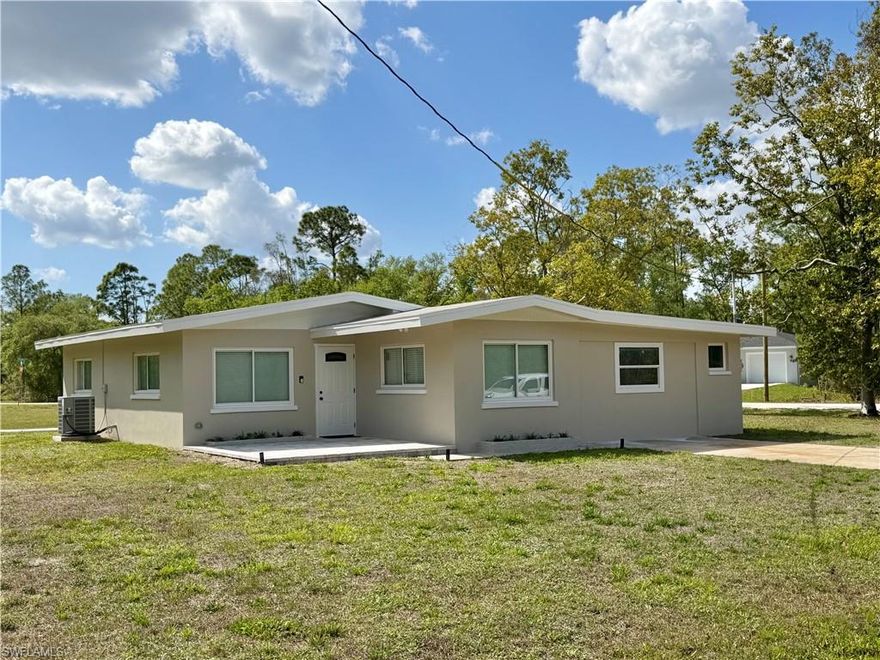 No Flood Insurance required. Plenty of room for all of your toys in Tropical Gulf Acres!  Lots of space to build your dream garage. Perfect location for RV owners due to proximity to the interstate. Updated mid century home on 2 cleared grassy lots, built 1967, over half an acre. 2 Bedrooms - 1 Bathroom - Soft close cabinets and drawers, stainless steel appliances, waterproof vinyl plank flooring - Bonus room w double doors to the large paved patio.  Near I-75 Tuckers Grade exit - only a 10 to 15 minute drive north to Downtown Punta Gorda or south to Downtown Fort Myers and approx 30 minutes to magnificent beaches. Young and old can play at updated Bissett Park with new playground and skate park which is just a short ride through the neighborhood -  Survey, Home Warranty and recent 4 Point inspection included. Insurance quote available.