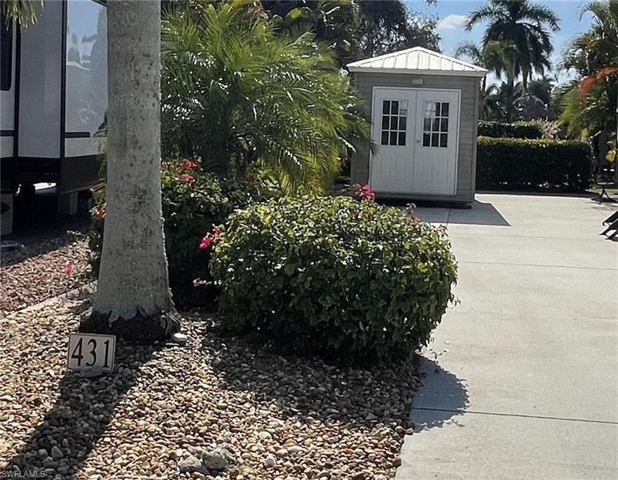 Welcome to your private, north-facing concrete/paver lot. Lot 431 is a beautiful pie-shaped private setting with rich lush landscaping. You'll appreciate the sounds of birds from the memorial garden at the back of this lot, which provides additional private space and a tropical feel as you sit and enjoy this wonderful resort. This lot offers a complete view of the open green space in front of it. This property includes everything you need for peace of mind, including water and sewer, high-speed internet, over 70 cable television channels, and a landscaping irrigation system. It includes an unfinished 8X15 shed with power, providing the ideal opportunity to construct and customize your own place.This community has so many activities and events, like live music concerts, dance events, fun excursions, craft shows, and so much more. If that is not enough, this resort has pickleball for advanced and casual play, tennis, water aerobics, cornhole, shuffleboard, and more. This pet-friendly park even thought about a pool for dog lovers within this spacious dog park. CYPRESS TRAIL RV Resort is conveniently located about 4 minutes from the entrance to Interstate 75. This gives you quick access to all of southwest Florida's gorgeous beaches, in addition to Fort Myers Beach and Sanibel Island. The resort features a magnificent pool and a spacious ballroom where we hold all of our dance and live music events, morning group yoga, exercise classes, and much more.