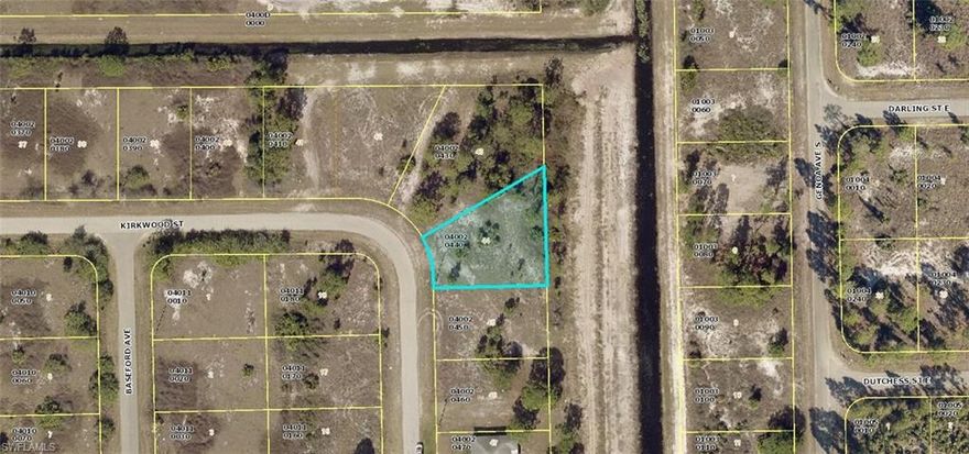 Build your dream home here!  Lot is mostly cleared, backs up to a canal and is just one block off SR82.  Easy access to shopping, schools, restaurants, churches, Fort Myers  Airport and the beaches.  Come enjoy all sunny SW Florida has to offer.