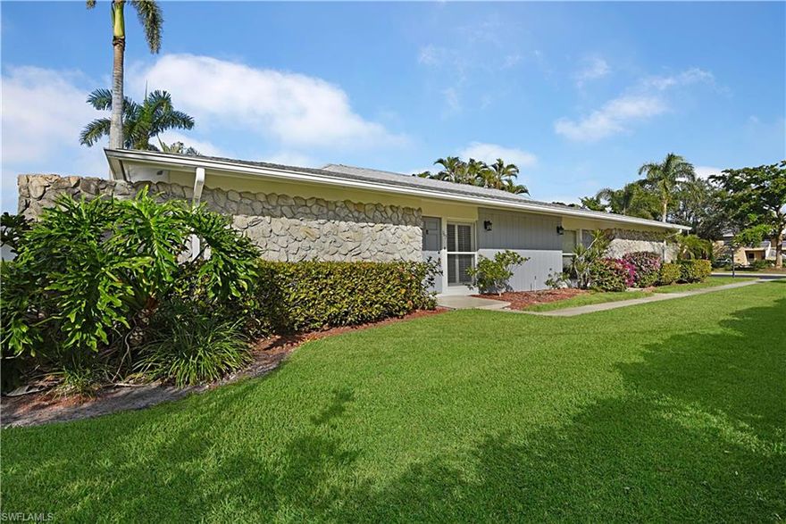 Don't miss this lovely 2 BR/2BA well maintained villa in desirable N. Naples. The only attached Villa available nestled in Palm River, wonderful safe quiet neighborhood, close to restaurants, hospital, shopping and minutes to the beach. Tile flooring throughout, upgraded appliances, eat in kitchen. Sliding glass doors lead to screened in lanai overlooking peaceful landscape area...priced to sell, opportunity knocking!