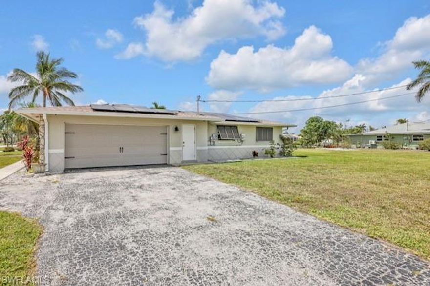 One or more photo(s) has been virtually staged, AI generated or rendered.  This home is ideal for a family or as an Airbnb investment, located conveniently close to schools, hospitals, shopping, and dining. For fishing enthusiasts, the property features a dock with direct Gulf access reachable within five minutes.

Key features include:

  - Interior: 3 bedrooms and 2 full bathrooms, recently renovated with new tiling and countertops. The primary bathroom has also been fully updated.
  - Infrastructure: The wiring has been completely replaced and updated throughout.
  - Exterior: The home sits on an oversized 0.42-acre lot and includes a patio with a private pool overlooking the canal.

The lot itself represents significant value; , making this larger property a remarkable opportunity for you if you are interested in building a new houses in this great location.