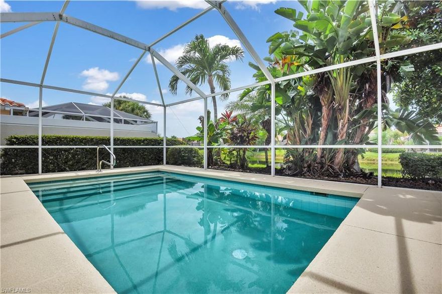 Wonderful lakefront home w/ pool! This attached villa lives just like a single family home and offers a comfortable layout on the interior and fantastic outdoor living space w/ lots of privacy. Perfect home for annual or seasonal SWFL living w/ vaulted ceilings, gorgeous bamboo flooring, lots of natural lighting, a living & family room layout, unique kitchen design accented w/ tile backsplash, stunning granite countertops, & glass doors on selected cabinets, tons of storage space w/ walk-in closets in both bedrooms that feature custom shelving and a large closet in the laundry room, retractable screen door at front entry, updated guest bath w/ under lighting on the vanity, and a 2-car garage. The split bedroom floor plan allows for plenty of privacy and the pool lanai w/ under truss sitting area is the ideal place to entertain or just relax in the SWFL sun. Village Walk of Naples offers a lifestyle community setting by having activities at the lakefront Town Center - fitness center, bocce ball, walk/jog paths, tennis, horseshoes, community room, library, post office, and 3 community pools. Fantastic location - less than 7 miles from the beaches & close to I-75.