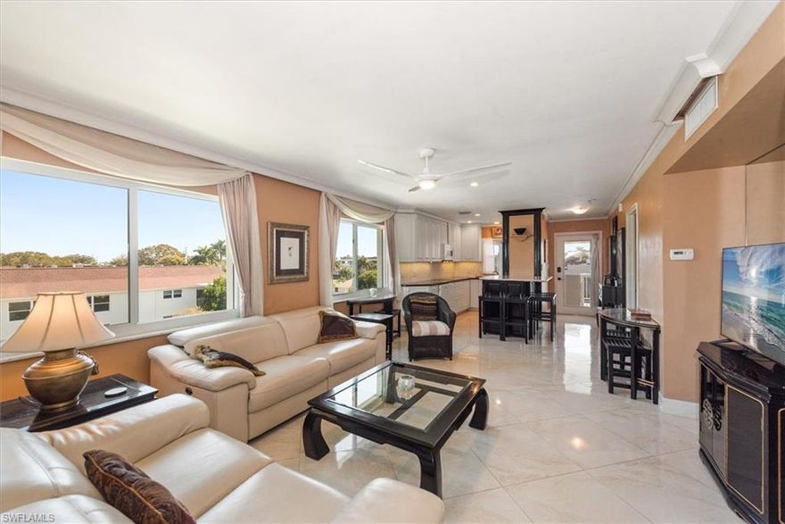 Rarely available - Third Floor END unit with 2 bedrooms 2 baths plus in-home office or den. This is the BEST location in the building. Unique style, light and bright unit with lots of windows, ready for your Buyer's TLC to make it their own. Outdoor grilling and dining area with paver patio and carport. Special features: Convection oven, induction cooktop, instant hot water, Onyx countertop in MB & kitchen, reclining leather couches, 75" TV in guest bedroom and large mirrored closet in master bedroom.
Fabulous location in the Heart of the Historic District. Situated between Crayton Cove and Naples City Docks and Third Street shopping and dining. 3 blocks to Naples beautiful beach.