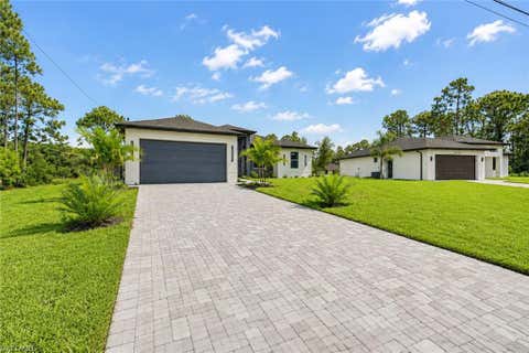 Photo of 720 Bennington DR, LEHIGH ACRES, FL 33974 (MLS # 226028955)