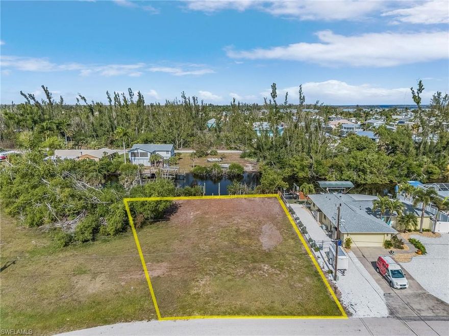 CLEARED LOT with boat dock and direct Gulf access located in Charlotte Shores One in Bokeelia. This community has access to a private boat ramp and marina that offers boat slips, kayak launch, fish cleaning station, and great green space. It is close to the bike and walk path, community pool, schools, stores, and great restaurants. The canal offers a short ride to open water with no bridges. Build your dream home on this lot and take advantage of all that Pine Island has to offer.