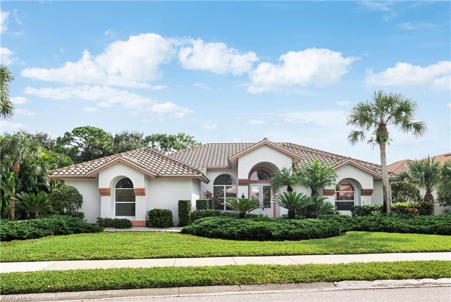 What a beautiful setting... Tremendous potential with a premium location.  The desirable Longlake section of Pelican Landing, welcomes residents to an exclusive enclave of beautiful custom homes, winding lushly landscaped streets, natural preserves, and estate sized lots.  Tranquil lake views and an abundance of natural light, greet you upon entry into this lovely 4 bedroom residence.  Priced to allow for updating by new owners, this home offers really "great bones" that would be most favorable for a high quality redesign.  Volume ceilings throughout, and a superb split floor plan that flows seamlessly from room to room.  The spacious formal and informal living areas, along with lanai, are wonderfully appointed for the most festive of gatherings.  And the bright open kitchen is sure to serve as the "heart of the home."  The World Class amenities of Pelican Landing include a private beach with shuttle, marina, community center with planned activities and events, bocce, pickleball, tennis, optional golf, and so much more.  All this while maintaining the integrity of the natural landscape that makes Southwest Florida so special.  A luxurious and natural retreat...