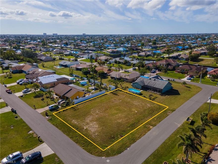 Oversized corner lot in desirable neighborhood, ready for you to build your dream home! All assessments paid! This lot is cleared and ready to build or ready to be added to your portfolio! Providing easy access to restaurants, shopping, and hospital! Close to both Midpoint bridge and and South Cape Coral bridge!