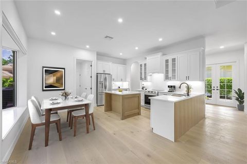 Photo of 9209 Troon Lakes DR, NAPLES, FL 34109 (MLS # 225051234)